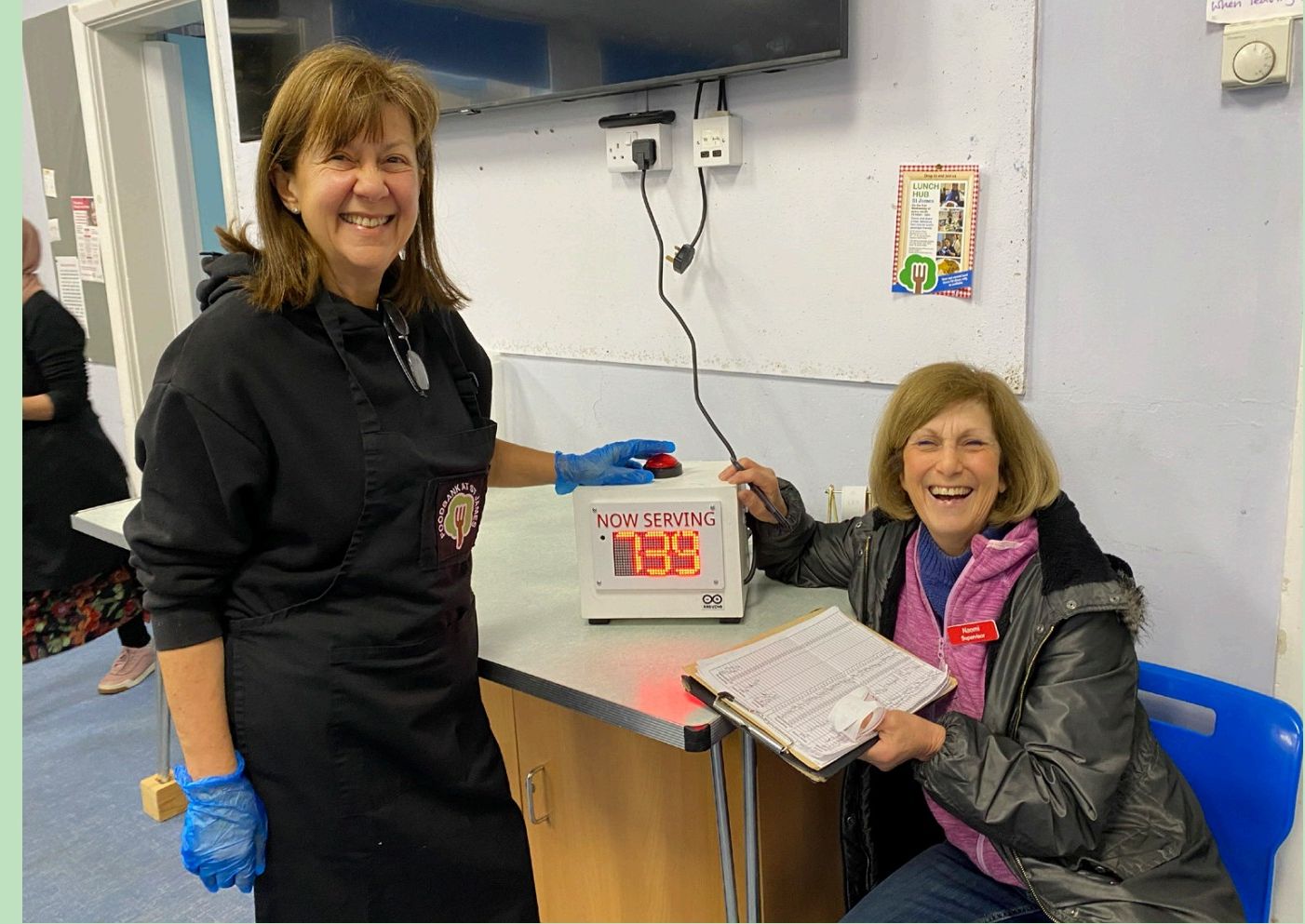 Volunteers serving food at a London distribution point