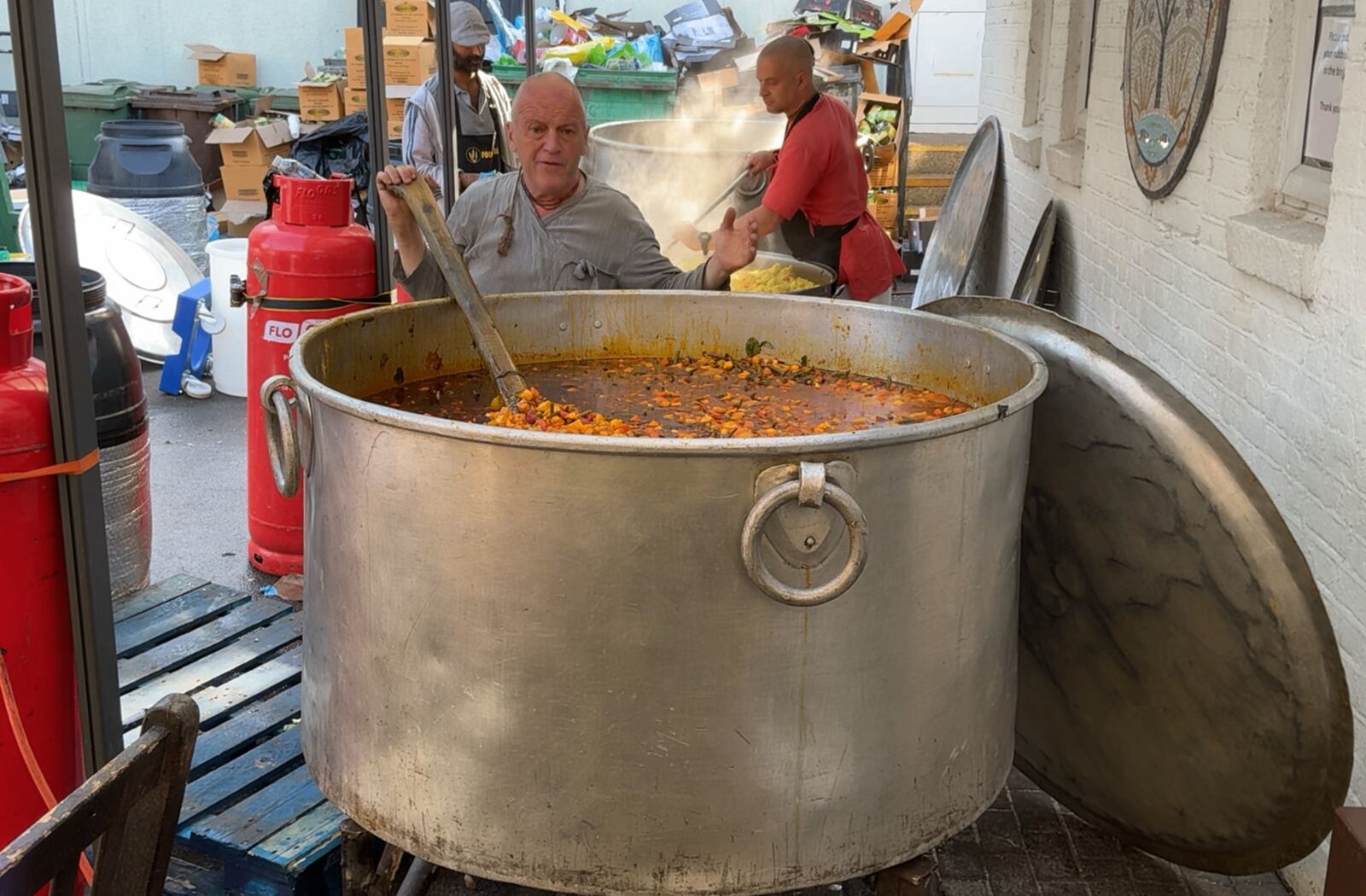 Meal being handed over at the Walthamstow Lunch Hub